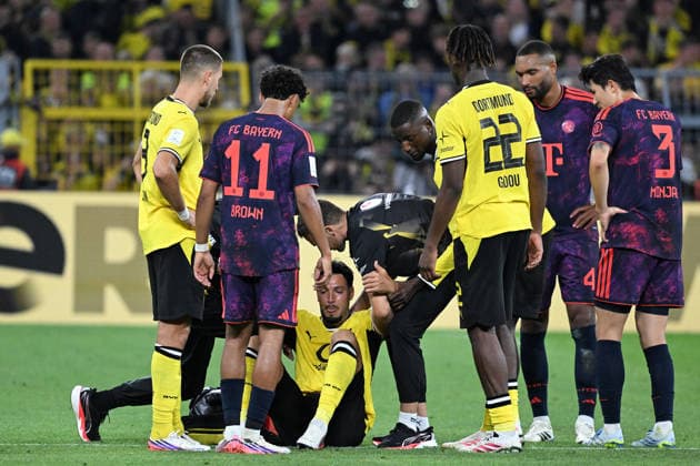 22.08.2026, xsltx, Fussball Franz Beckenbauer Supercup 2026, Borussia Dortmund - FC Bayern München v.l. Ramy Bensebaini (Borussia Dortmund) verletzt, Verletzung, Schmerz, Schmerzen (DFL DFB REGULATIONS PROHIBIT ANY USE OF PHOTOGRAPHS as IMAGE SEQUENCES and or QUASI-VIDEO) Dortmund *** August 22, 2026, xsltx, Soccer Franz Beckenbauer 2026 Super Cup, Borussia Dortmund vs. FC Bayern Munich: Ramy Bensebaini of Borussia Dortmund injured, injury, pain, DFL and DFB regulations prohibit any use of photographs as image sequences and or quasi-video, Dortmund