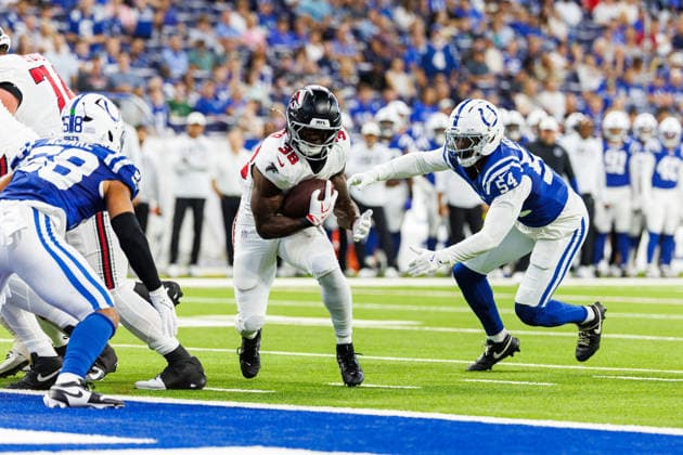 Aug 22, 2026; Indianapolis, Indiana, USA; Atlanta Falcons running back Nate Carter (38) runs with the ball for a touchdown as Indianapolis Colts defensive lineman Mitchell Melton (54) pursues during NFL, American Football Herren, USA preseason game action at Lucas Oil Stadium. Mandatory Credit: -Cal Media NFL 2026: Falcons Vs Colts AUG 22  - ZUMAc04_ 20260822_zma_c04_006 Copyright: xJohnxMersitsx