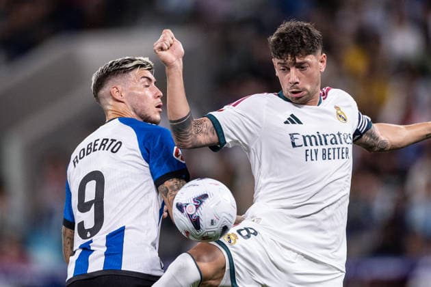BARCELONA, SPAIN - AUGUST 22: Federico Valverde of Real Madrid (R) and Roberto Fernandez of Espanyol (L) fight for possession during the LaLiga EA Sports football match between Espanyol and Real Madrid at Estadio RCDE on August 22, 2026 in Barcelona, Spain. (Photo by Ricardo Nogueira Sports Press Photo)  Copyright: xRicardoxNogueira SportsxPressxPhotox Sportspressphoto_SPR212753