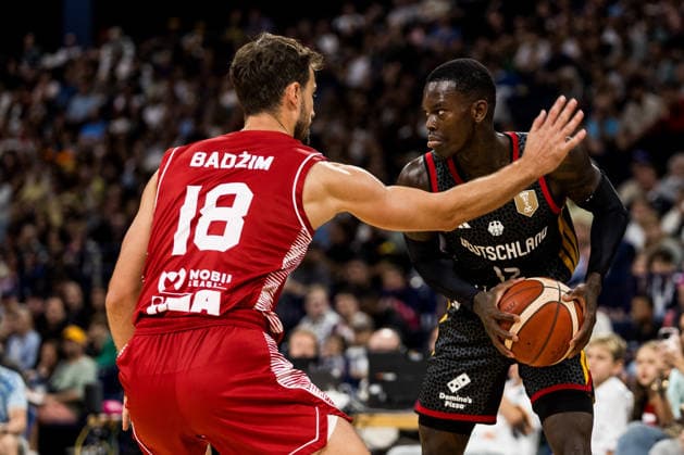 HAMBURG, GERMANY - AUGUST 22: Dennis Schroeder (Schröder, Schroder, Germany, 17) controls the ball against Roko Badzim (Croatia, 18) during the Turkish Airlines Basketball Supercup final match between Germany vs. Croatia at Barclays Arena on August 22, 2026 in Hamburg, Germany. Hamburg Germany Copyright: xSteffiexWunderlx