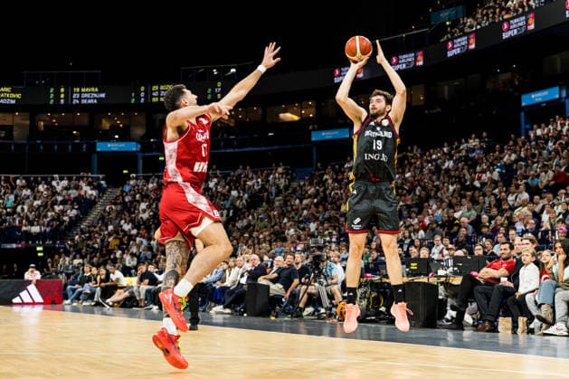 HAMBURG, GERMANY - AUGUST 22: Kay Bruhnke (Germany, 19) shooting a three pointer over Karlo Matkovic (Croatia, 17) during the Turkish Airlines Basketball Supercup final match between Germany vs. Croatia at Barclays Arena on August 22, 2026 in Hamburg, Germany. Hamburg Germany Copyright: xSteffiexWunderlx