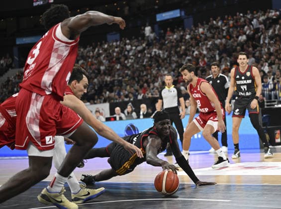 Germany v Croatia - Turkish Airlines Supercup 2026 HAMBURG, GERMANY - AUGUST 22: Germany s Isaac Bonga (C) in action during the Turkish Airlines Basketball Supercup 2026 match between Germany and Croatia at Barclays Arena in Hamburg, Germany, on August 22, 2026. Halil Sagirkaya Anadolu Hamburg Germany. Editorial use only. Please get in touch for any other usage.  Copyright: x2026xAnadoluxHalilxSagirkayax