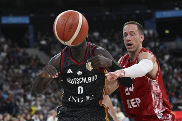 Germany v Croatia - Turkish Airlines Supercup 2026 HAMBURG, GERMANY - AUGUST 22: Germany s Isaac Bonga (L) in action during the Turkish Airlines Basketball Supercup 2026 match between Germany and Croatia at Barclays Arena in Hamburg, Germany, on August 22, 2026. Halil Sagirkaya Anadolu Hamburg Germany. Editorial use only. Please get in touch for any other usage.  Copyright: x2026xAnadoluxHalilxSagirkayax