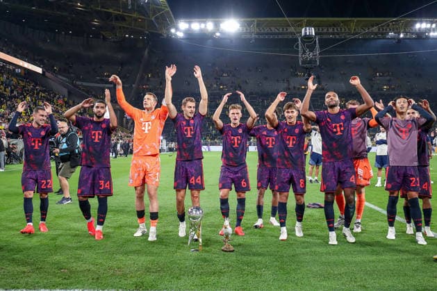 22.08.2026, Fußball, Borussia Dortmund - FC Bayern München, Signal Iduna Park, Saison 2026 2027: Die Mannschaft steht jubelnd vor den Fans Abschlussjubel L-R Arijon Ibrahimovic (FC Bayern München 22) Ismael Saibari (FC Bayern München 34) Torwart Manuel Neuer (FC Bayern München 01) Josip Stanisic (FC Bayern München 44) Joshua Kimmich (FC Bayern München 06) Tom Bischof (FC Bayern München 08) Jonathan Tah (FC Bayern München 04) Hiroki Ito (FC Bayern München 21) DFB regulations prohibit any use of photographs as image sequences and or quasi-video. Nordrhein-Westfalen Deutschland *** August 22, 2026, Soccer, Borussia Dortmund vs. FC Bayern Munich, Signal Iduna Park, 2026–2027 Season The team stands celebrating in front of the fans. Final celebration: L R Arijon Ibrahimovic, FC Bayern Munich 22; Ismael Saibari, FC Bayern Munich 34; Goalie Manuel Neuer, FC Bayern Munich 01; Josip Stanisic, FC Bayern Munich 44; Joshua Kimmich, FC Bayern Munich 06 Tom Bischof FC Bayern Munich 08 Jonathan Tah FC Bayern Munich 04 Hiroki Ito FC Bayern Munich 21 DFB regulations prohibit any use of photographs as image sequences and or quasi-video. North Rhine-Westphalia, Germany