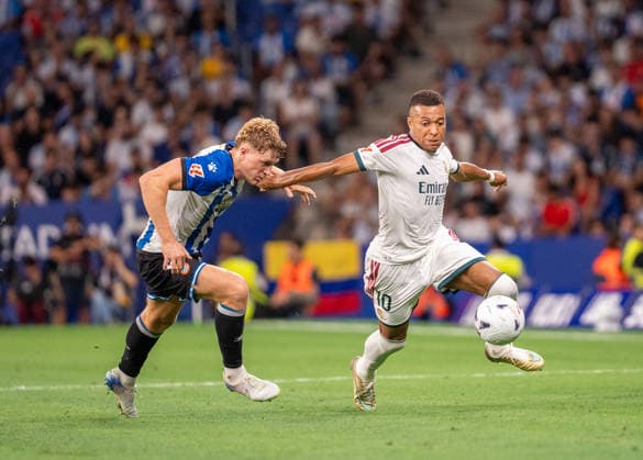 ESP: LaLiga EA Sports RCD Espanyol de Barcelona v Real Madrid Kylian Mbappe of Real Madrid and Clemens Riedel of Espanyol during LaLiga EA Sports match between RCDE Espanyol de Barcelona v Real Madrid played at RCDE Stadium, Cornella de Llobregat, Barcelona on August 22 2026 in Spain Spain Soccer *** ESP LaLiga EA Sports RCD Espanyol de Barcelona vs. Real Madrid Kylian Mbappé of Real Madrid and Clemens Riedel of Espanyol during the LaLiga EA Sports match between RCDE Espanyol de Barcelona and Real Madrid played at RCDE Stadium, Cornellà de Llobregat, Barcelona on August 22, 2026 in Spain. Spanish Soccer Copyright: xAgenciaxLOFx