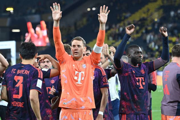 Siegerehrung fuer FC Bayern Muenchen Die Mannschaft vor ihren Fans, Torwart Manuel NEUER (M) und Dayot UPAMECANO (M), Jubel, jubeln, Freude, cheers, Fussball DFL Franz Beckenbauer Supercup 2026 Borussia Dortmund - FC Bayern Muenchen 1-2 am 22.08.2026 in Dortmund Deutschland. DFL regulations prohibit any use of photographs as image sequences and or quasi-video Â *** Award Ceremony for FC Bayern Munich: The team in front of their fans, goalkeeper Manuel NEUER (M) and Dayot UPAMECANO (M), celebration, cheering, joy, cheers, soccer, DFL, Franz Beckenbauer, Super Cup 2026, Borussia Dortmund, FC Bayern Munich 1–2 on August 22, 2026, in Dortmund, Germany. DFL regulations prohibit any use of photographs as image sequences and or quasi-video.