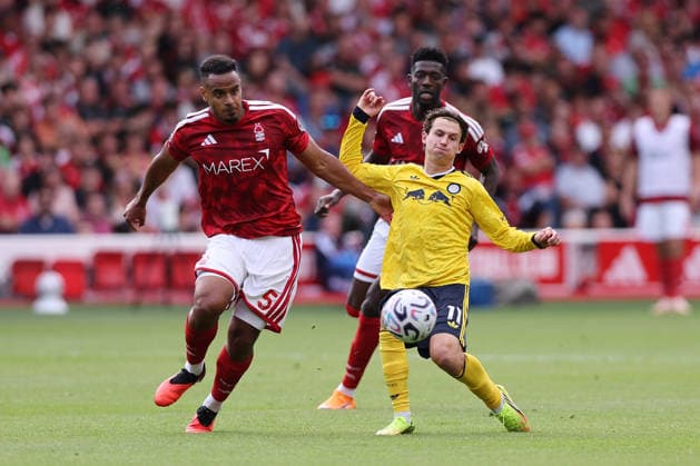 Nottingham, England, 22nd August 2026. Murillo of Nottingham Forest with Brenden Aaronson of Leeds United during the Nottingham Forest vs Leeds United Premier League match at the City Ground, Nottingham. Picture credit should read: David Klein Sportimage EDITORIAL USE ONLY. No use with unauthorised audio, video, data, fixture lists, club league logos or live services. Online in-match use limited to 120 images, no video emulation. No use in betting, games or single club league player publications. SPI_080_DK_Forest_Leeds SPI-4934-0079