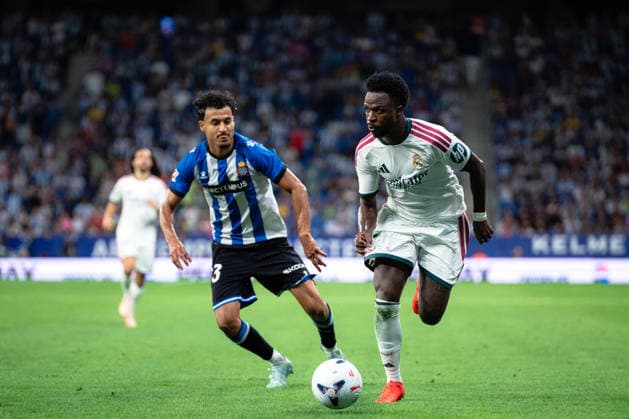 Spanish LaLiga EA Sports RCD Espanyol v Real Madrid CF in Cornella, Spain. Real Madrid player Vinicius Junior (7) vies with Omar El Hilali (23) during LaLiga EA Sports match between RCD Espanyol and Real Madrid CF in RCDE Stadium, Cornella, Spain, on August 22, 2026. Cornella RCDE Stadium Barcelona Spain