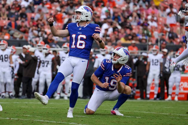 CLEVELAND, OH - AUGUST 22: Buffalo Bills place kicker Tyler Bass (16) kicks an extra point out of the hold of Buffalo Bills punter Mitch Wishnowsky (19) during the first quarter of the National Football League preseason game between the Buffalo Bills and Cleveland Browns on August 22, 2026, at Huntington Bank Field in Cleveland, OH. (Photo by Frank Jansky Icon Sportswire) NFL, American Football Herren, USA AUG 22 Bills at Browns EDITORIAL USE ONLY Icon260822053