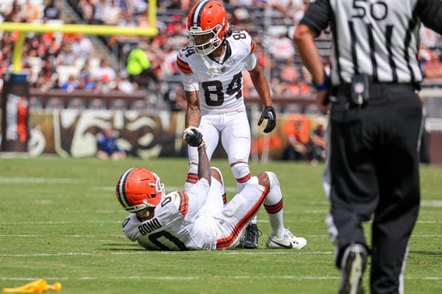CLEVELAND, OH - AUGUST 22: Cleveland Browns wide receiver Gage Larvadain (84) helps Cleveland Browns wide receiver Isaiah Bond (0) to his feet after pass interference call against Buffalo Bills cornerback Toriano Pride Jr. (32) (not pictured) during the second quarter of the National Football League preseason game between the Buffalo Bills and Cleveland Browns on August 22, 2026, at Huntington Bank Field in Cleveland, OH. (Photo by Frank Jansky Icon Sportswire) NFL, American Football Herren, USA AUG 22 Bills at Browns EDITORIAL USE ONLY Icon260822059