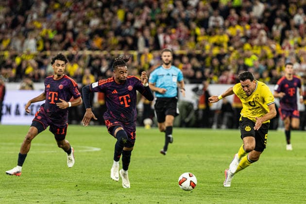Franz-Beckenbauer-Supercup 2026: Borussia Dortmund - FC Bayern München; 22.08.2026 Michael Olise (FC Bayern München, 17), Ramy Bensebaini (Borussia Dortmund, 5) Franz-Beckenbauer-Supercup 2026: Borussia Dortmund - FC Bayern München; Signal Iduna Park, Dortmund; 22.08.2026 *** Franz Beckenbauer Super Cup 2026 Borussia Dortmund vs. FC Bayern Munich August 22, 2026 Michael Olise, FC Bayern Munich, 17, Ramy Bensebaini, Borussia Dortmund, 5 Franz Beckenbauer Super Cup 2026 Borussia Dortmund vs. FC Bayern Munich, Signal Iduna Park, Dortmund, August 22, 2026 Copyright: xBEAUTIFULxSPORTS Buriakovx