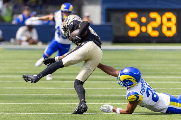 August 22, 2026, Inglewood, California, USA: New Orleans Saints Wide Receiver Bub Means (85) escapes a tackle-attempt by Los Angeles Rams Cornerback Nyzier Fourqurean (25) during an NFL, American Football Herren, USA football preseason game, in Inglewood, Calif. on Saturday August 22, 2026. Inglewood USA - ZUMAc68_ 20260822_zaf_c68_040 Copyright: xRingoxChiux