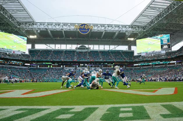 MIAMI GARDENS, FL - AUGUST 22: Miami Dolphins quarterback Cam Miller (15) tries to avoid a sack in the second half during the preseason NFL, American Football Herren, USA game between the New York Giants and the Miami Dolphins on Saturday, August 22, 2026 at Hard Rock Stadium in Miami, FL (Photo by Peter Joneleit Icon Sportswire) NFL: AUG 22 Giants at Dolphins EDITORIAL USE ONLY Icon260822010
