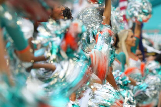 MIAMI GARDENS, FL - AUGUST 22: Pom poms are shaken by Miami Dolphins cheerleaders before the preseason NFL, American Football Herren, USA game between the New York Giants and the Miami Dolphins on Saturday, August 22, 2026 at Hard Rock Stadium in Miami, FL (Photo by Peter Joneleit Icon Sportswire) NFL: AUG 22 Giants at Dolphins EDITORIAL USE ONLY Icon260822039
