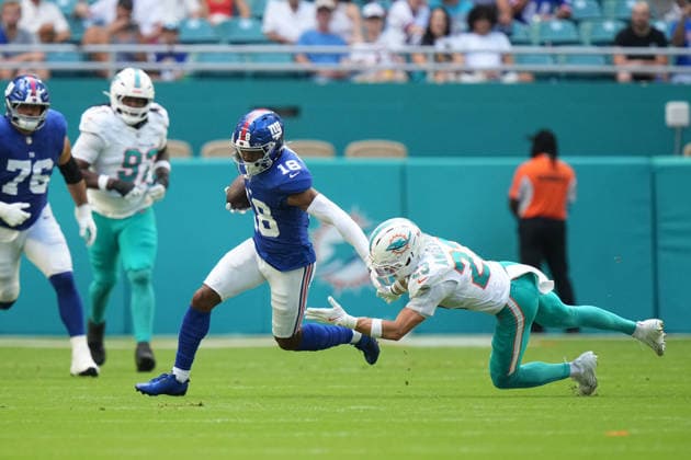 MIAMI GARDENS, FL - AUGUST 22: New York Giants wide receiver Darius Slayton (18) evades Miami Dolphins defensive back Zayne Anderson (23) as he runs after a catch in the first quarter during the preseason NFL, American Football Herren, USA game between the New York Giants and the Miami Dolphins on Saturday, August 22, 2026 at Hard Rock Stadium in Miami, FL (Photo by Peter Joneleit Icon Sportswire) NFL: AUG 22 Giants at Dolphins EDITORIAL USE ONLY Icon260822043