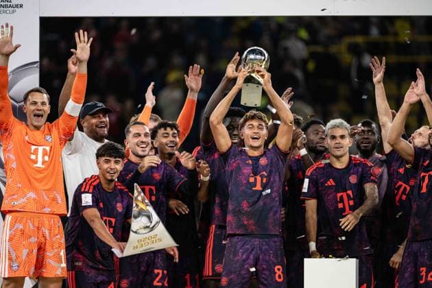 Tom Bischof 8 (FC Bayern Muenchen) mit Pokal, Borussia Dortmund vs. FC Bayern Muenchen, Fussball, Franz Beckenbauer Supercup, 22.08.2026 DFB regulations prohibit any use of photographs as image sequences and or quasi-video Dortmund Nordrhein-Westfalen Deutschland *** Tom Bischof 8 FC Bayern Munich with trophy, Borussia Dortmund vs. FC Bayern Munich, soccer, Franz Beckenbauer Super Cup, August 22, 2026. DFB regulations prohibit any use of photographs as image sequences and or quasi-video. Dortmund, North Rhine-Westphalia, Germany Copyright: xkolbert-press MarcxNiemeyerx