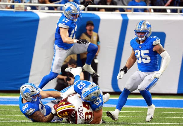 Washington Commanders vs Detroit Lions DETROIT,MICHIGAN-AUGUST 22: Washington Commanders wide receiver Jacoby Jones (84) is stopped by Detroit Lions linebacker Trevor Nowaske (53) Detroit Lions safety Dan Jackson (17), Detroit Lions defensive end Ahmed Hassanein (99) and Detroit Lions linebacker Joe Bachie (35) during the second half of an NFL, American Football Herren, USA preseason football game between the Washington Commanders and the Detroit Lions in Detroit, Michigan USA, on Saturday, August 22, 2026 Detroit Michigan United States  Copyright: xAmyxLemusx originalFilename:lemus-washingt260822_npXOQ.jpg