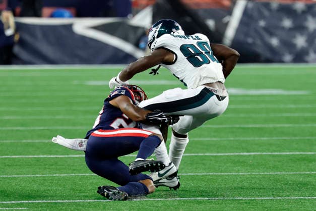 FOXBOROUGH, MA - AUGUST 22: Darius Cooper 80 of the Philadelphia Eagles caught by Kindle Vildor 28 of the New England Patriots during a preseason game between the New England Patriots and the Philadelphia Eagles on August 22, 2026, at Gillette Stadium in Foxborough, Massachusetts. (Photo by Fred Kfoury III Icon Sportswire) NFL, American Football Herren, USA AUG 22 Eagles at Patriots EDITORIAL USE ONLY Icon482260822021