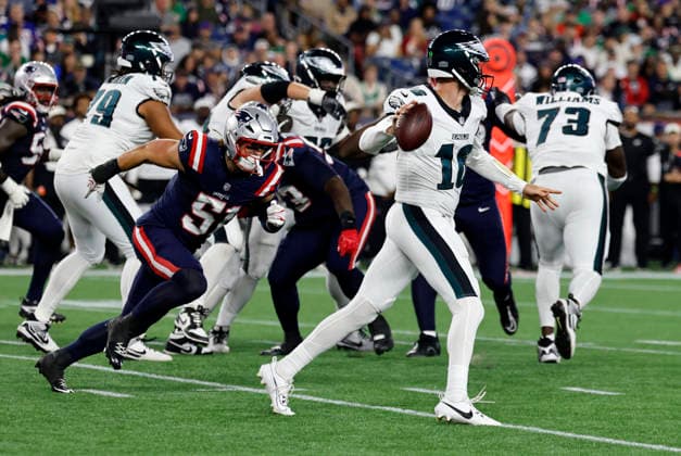 FOXBOROUGH, MA - AUGUST 22: Riley Wilson 51 of the New England Patriots chases after Tanner McKee 16 of the Philadelphia Eagles during a preseason game between the New England Patriots and the Philadelphia Eagles on August 22, 2026, at Gillette Stadium in Foxborough, Massachusetts. (Photo by Fred Kfoury III Icon Sportswire) NFL, American Football Herren, USA AUG 22 Eagles at Patriots EDITORIAL USE ONLY Icon482260822040