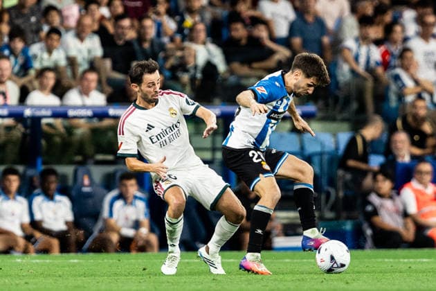 August 22, 2026, Barcelona, Catalonia, Spain: BARCELONA, SPAIN - AUGUST 22: Javi Hernandez of RCD Espanyol challenges Bernardo Silva of Real Madrid for the ball during the LaLiga EA Sports match between RCD Espanyol and Real Madrid at RCDE Stadium on Barcelona, Spain. Soccer 2026: RCD Espanyol V Real Madrid - LaLiga EA Sports  - ZUMAs316 20260822_znp_s316_055 Copyright: xMartixSeguraxRamonedax