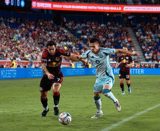 August 22, 2026, Harrison, New Jersey, USA: CADE COWELL (7) of the New York Red Bulls battles for the ball with VIKTOR RADOJEVIC (14) of Chicago Fire during a Major League Soccer match at Sports Illustrated Stadium. Harrison USA - ZUMAp306 20260822_znp_p306_006 Copyright: xOmarxPerezxLopezx