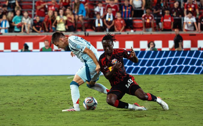 August 22, 2026, Harrison, New Jersey, USA: RONALD DONKOR (48) of the New York Red Bulls battles for the ball with VIKTOR RADOJEVIC (14) of Chicago Fire in midfield during a Major League Soccer match at Sports Illustrated Stadium. MLS, Fussball Herren, USA 2026: New York Red Bullls 1:1 Chicago Fire  - ZUMAp306 20260822_znp_p306_001 Copyright: xOmarxPerezxLopezx