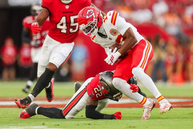 August 22, 2026, Tampa, Florida, USA: Kansas City Chiefs wide receiver CYRUS ALLEN (13) is tackled by Tampa Bay Buccaneers defensive back KEIONTE SCOTT (22) at an NFL, American Football Herren, USA preseason game between the Kansas City Chiefs and Tampa Bay Buccaneers at Raymond James Stadium on August 22, 2026 in Tampa, Florida. Tampa USA - ZUMAs335 20260822_znp_s335_002 Copyright: xMatthewxSmithx