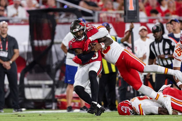 Aug 22, 2026; Tampa, Florida, USA; Tampa Bay Buccaneers quarterback Jalon Daniels (10) tackled during an NFL, American Football Herren, USA game between the Kansas City Chiefs and Tampa Bay Buccaneers at Raymond James Stadium in Tampa, Florida. Mandatory Credit: Taylor McFee-Cal Media Tampa USA - ZUMAc04_ 20260822_zma_c04_409 Copyright: xTaylorxMcfeex