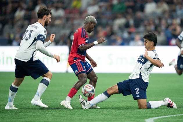 August 22, 2026, Vancouver, Bc, CANADA: Vancouver Whitecaps Mathias Laborda (2) stops FC Dallas Bernard Kamungo, centre, as Tristan Blackmon (33) watches during the second half of an MLS, Fussball Herren, USA soccer match in Vancouver, on Saturday, August 22, 2026. Canada News - August 22, 2026  - ZUMAc35_ 20260822_zaf_c35_226 Copyright: xEthanxCairnsx