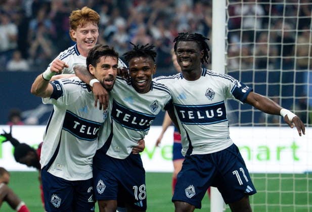 August 22, 2026, Vancouver, Bc, CANADA: Vancouver Whitecaps Brian White, left, celebrates his goal against FC Dallas with Edier Ocampo (18), Emmanuel Sabbi (11) and Oliver Larraz, back, during the first half of an MLS, Fussball Herren, USA match in Vancouver, on Saturday, August 22, 2026. Canada News - August 22, 2026  - ZUMAc35_ 20260822_zaf_c35_232 Copyright: xEthanxCairnsx