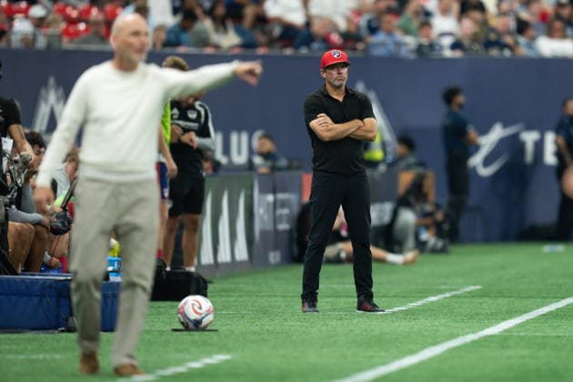 August 22, 2026, Vancouver, Bc, CANADA: FC Dallas head coach Eric Quill, back, watches Vancouver Whitecaps head coach Jesper Sorensen during the second half of an MLS, Fussball Herren, USA soccer match in Vancouver, on Saturday, August 22, 2026. Canada News - August 22, 2026  - ZUMAc35_ 20260822_zaf_c35_234 Copyright: xEthanxCairnsx
