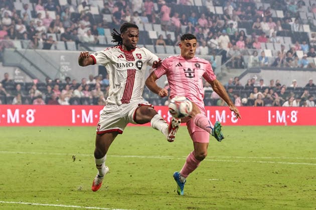 MIAMI, FL - AUGUST 22: Zane Monlouis (12) of the Toronto FC and German Berterame (19) of Inter Miami CF battle for a ball during the MLS, Fussball Herren, USA match between Toronto FC and Inter Miami CF on August 22,2026 at NU Stadium, Miami, Fla.(Photo by Chris Arjoon Icon Sportswire) SOCCER: AUG 22 MLS Inter Miami CF vs Toronto FC EDITORIAL USE ONLY Icon2608220000032