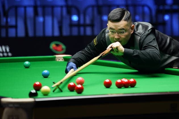 WUHAN, CHINA - AUGUST 23: Guan Zhen of China plays a shot in the first round match against Gao Yang of China on day 1 of Wuhan Open 2026 at the Optics Valley Gymnasium of Huazhong University of Science and Technology on August 23, 2026 in Wuhan, Hubei Province of China.  Copyright: xTaixChengzhex 111661617315