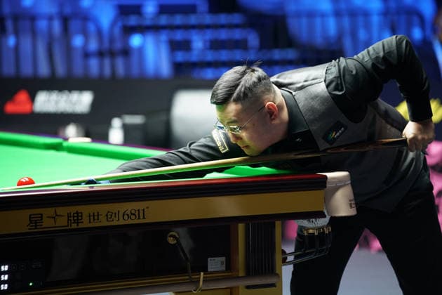 WUHAN, CHINA - AUGUST 23: Guan Zhen of China plays a shot in the first round match against Gao Yang of China on day 1 of Wuhan Open 2026 at the Optics Valley Gymnasium of Huazhong University of Science and Technology on August 23, 2026 in Wuhan, Hubei Province of China.  Copyright: xTaixChengzhex 111661617304