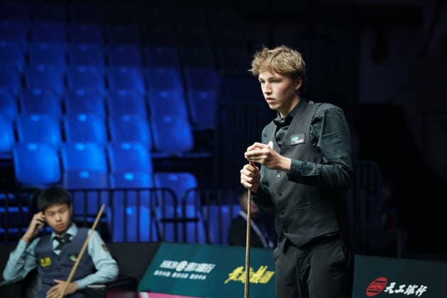 WUHAN, CHINA - AUGUST 23: Ben Mertens of Belgium chalks the cue in the first round match against Wang Xinzhong of China on day 1 of Wuhan Open 2026 at the Optics Valley Gymnasium of Huazhong University of Science and Technology on August 23, 2026 in Wuhan, Hubei Province of China.  Copyright: xTaixChengzhex 111661617839