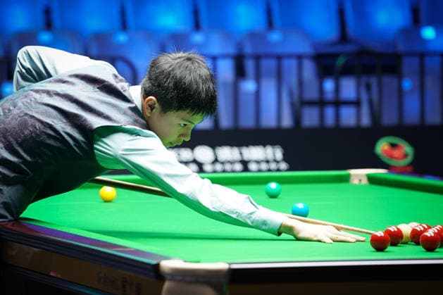 WUHAN, CHINA - AUGUST 23: Wang Xinzhong of China plays a shot in the first round match against Ben Mertens of Belgium on day 1 of Wuhan Open 2026 at the Optics Valley Gymnasium of Huazhong University of Science and Technology on August 23, 2026 in Wuhan, Hubei Province of China.  Copyright: xTaixChengzhex 111661617844