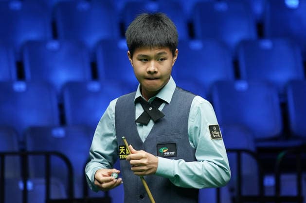 WUHAN, CHINA - AUGUST 23: Wang Xinzhong of China chalks the cue in the first round match against Ben Mertens of Belgium on day 1 of Wuhan Open 2026 at the Optics Valley Gymnasium of Huazhong University of Science and Technology on August 23, 2026 in Wuhan, Hubei Province of China.  Copyright: xTaixChengzhex 111661617846