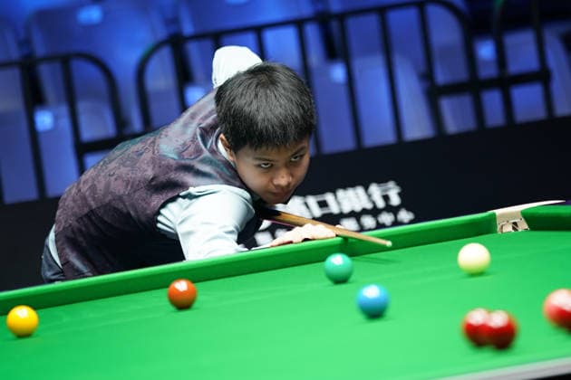 WUHAN, CHINA - AUGUST 23: Wang Xinzhong of China plays a shot in the first round match against Ben Mertens of Belgium on day 1 of Wuhan Open 2026 at the Optics Valley Gymnasium of Huazhong University of Science and Technology on August 23, 2026 in Wuhan, Hubei Province of China.  Copyright: xTaixChengzhex 111661617847