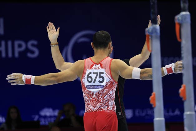 Zagreb, 22.08.2026. - 37TH EUROPEAN MEN™S ARTISTIC GYMNASTICS, Men s Artistic Gymnastics Apparatus Final Parallel bars Individual SENIORS. 675 ARICAN Ferhat (TUR) and coach YÄ±lmaz Goktekin Men s Artistic Gymnastics Apparatus Final Parallel bars Individual SENIORS  2S6A8119.JPG