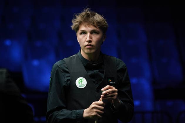 WUHAN, CHINA - AUGUST 23: Ben Mertens of Belgium chalks the cue in the first round match against Wang Xinzhong of China on day 1 of Wuhan Open 2026 at the Optics Valley Gymnasium of Huazhong University of Science and Technology on August 23, 2026 in Wuhan, Hubei Province of China.  Copyright: xTaixChengzhex 111661617836