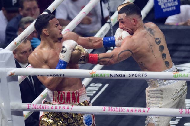 August 22, 2026, Las Vegas, Nevada, USA: ROLLY ROMERO (L) landed a solid left hook to TEOFIMO LOPEZ (R) during the PBC on DAZN at the T Mobile Arena in Las Vegas Las Vegas USA - ZUMAo117 20260822_zsp_o117_007 Copyright: xMikaelxOnax