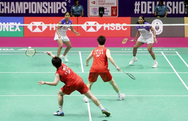 August 22, 2026, New Delhi, New Delhi, India: NEW DELHI, INDIA AUGUST 22, 2026: China s Liu Sheng Shu and Tan Ning Pullela play a shot against India s Treesa Jolly right and Gayatri Gopichandduring their women s doubles semi-final match at the BWF World Championships 2026 in New Delhi, India, on Saturday, August 22, 2026. The Indian pair fought hard before going down 21-18, 13-21, 8-21, securing a historic bronze medal. Zuma Press City: New DelhiState: New DelhiCountry: IndiaCategory: INTDate: 22.08.2026ZUMA Categories: IN New Delhi India - ZUMAd288 20260822_zip_d288_029 Copyright: xDeepakx New Delhi India - ZUMA0864 0864619157st Copyright: xIMAGO Deepakx
