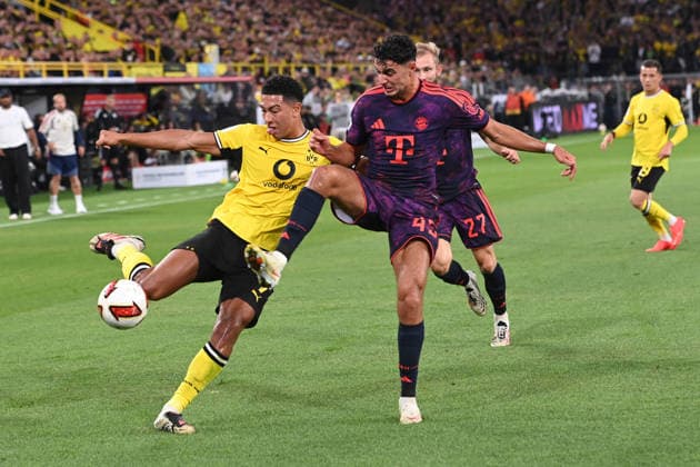 Jobe BELLINGHAM (DO) gegen Aleksandar PAVLOVIC (M) Aktion, Zweikampf, Fussball DFL Franz Beckenbauer Supercup 2026 Borussia Dortmund - FC Bayern Muenchen am 22.08.2026 in Dortmund Deutschland. DFL regulations prohibit any use of photographs as image sequences and or quasi-video Â *** Jobe BELLINGHAM (DO) vs. Aleksandar PAVLOVIC (M) Action, Tackle, Soccer DFL Franz Beckenbauer Super Cup 2026 Borussia Dortmund vs. FC Bayern Munich on August 22, 2026, in Dortmund, Germany. DFL regulations prohibit any use of photographs as image sequences and or quasi-video.