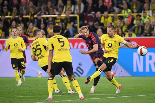 Waldemar Anton (Borussia Dortmund), Harry Kane (Bayern Muenchen), Ramy Bensebaini (Borussia Dortmund), Joey Veerman (Borussia Dortmund), v.re. 22.08.2026, Fussball, Saison 2026 2027, Franz-Beckenbauer-Supercup 2026, Finale, Borussia Dortmund - FC Bayern München 1:2 DFL regulations prohibit any use of photographs as image sequences and or quasi-video Dortmund Signal Iduna Park Nordrhein Westfalen Deutschland *** Waldemar Anton, Borussia Dortmund; Harry Kane, Bayern Munich; Ramy Bensebaini, Borussia Dortmund; Joey Veerman, Borussia Dortmund; August 22, 2026; Soccer; 2026–2027 season; Franz Beckenbauer, 2026 Super Cup, Final, Borussia Dortmund vs. FC Bayern Munich 1–2. DFL regulations prohibit any use of photographs as image sequences and or quasi-video. Dortmund, Signal Iduna Park, North Rhine-Westphalia, Germany Team2