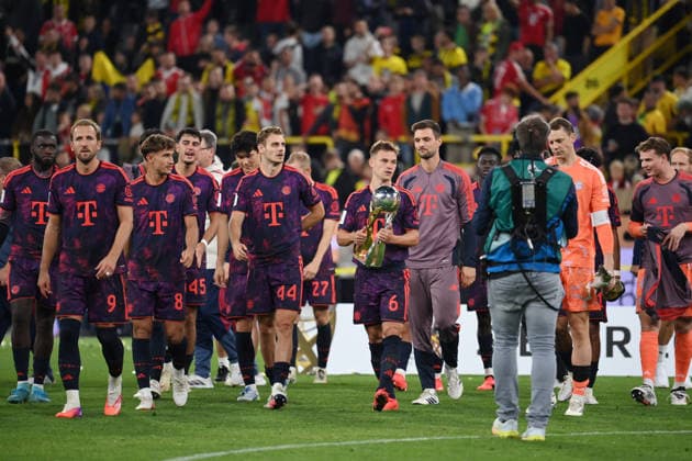 Bayerns Spieler feiern den Supercup Gewinn, Joshua Kimmich (Bayern Muenchen) mit dem Pokal 22.08.2026, Fussball, Saison 2026 2027, Franz-Beckenbauer-Supercup 2026, Finale, Borussia Dortmund - FC Bayern München 1:2 DFL regulations prohibit any use of photographs as image sequences and or quasi-video Dortmund Signal Iduna Park Nordrhein Westfalen Deutschland *** Bayern players celebrate winning the Super Cup; Joshua Kimmich of Bayern Munich with the trophy, August 22, 2026; soccer; 2026–2027 season; Franz Beckenbauer, 2026 Super Cup, Final, Borussia Dortmund vs. FC Bayern Munich 1–2. DFL regulations prohibit any use of photographs as image sequences and or quasi-video. Dortmund, Signal Iduna Park, North Rhine-Westphalia, Germany Team2