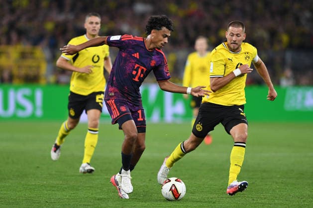 Nathaniel Brown (FC Bayern Muenchen) und Waldemar Anton (Borussia Dortmund) im Zweikampf waehrend des Franz-Beckenbauer-Supercup Endspiel 2026 zwischen Borussia Dortmund und FC Bayern Muenchen, Signal Iduna Park am 22. August 2026 in Dortmund, Deutschland. (Foto von Ralf Treese DeFodi Images) +++ Nathaniel Brown (FC Bayern Muenchen) und Waldemar Anton (Borussia Dortmund) battle for the ball during the Franz Beckenbauer Supercup match between Borussia Dortmund and FC Bayern Muenchen at Signal Iduna Park on August 22, 2026 in Dortmund, Germany. (Photo by Ralf Treese DeFodi Images) - *** Nathaniel Brown of FC Bayern Munich and Waldemar Anton of Borussia Dortmund battle for the ball during the 2026 Franz Beckenbauer Super Cup final between Borussia Dortmund and FC Bayern Munich at Signal Iduna Park on August 22, 2026, in Dortmund, Germany. Photo by Ralf Treese, DeFodi Images. Nathaniel Brown of FC Bayern Munich and Waldemar Anton of Borussia Dortmund battle for the ball during the Franz Beckenbauer Super Cup match between Borussia Dortmund and FC Bayern Munich at Signal Iduna Park on August 22, 2026 in Dortmund, Germany Photo by Ralf Treese DeFodi Images