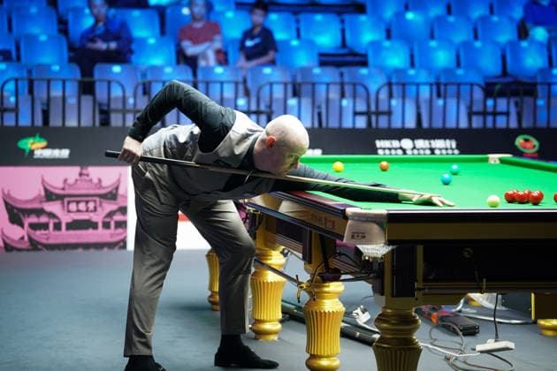 WUHAN, CHINA - AUGUST 23: Chris Wakelin of England plays a shot in the first round match against Jordan Brown of Northern Ireland on day 1 of Wuhan Open 2026 at the Optics Valley Gymnasium of Huazhong University of Science and Technology on August 23, 2026 in Wuhan, Hubei Province of China.  Copyright: xTaixChengzhex 111661654917