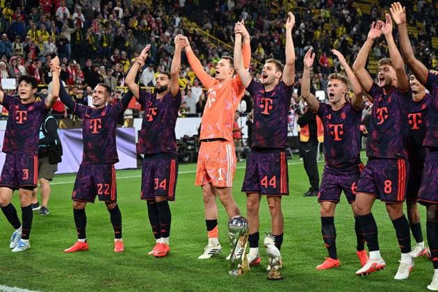Min-jae Kim (FC Bayern Muenchen), Arijon Ibrahimovic (FC Bayern Muenchen), Ismael Saibari (FC Bayern Muenchen), Torwart Manuel Neuer (FC Bayern Muenchen), Josip Stanisic (FC Bayern Muenchen), Joshua Kimmich (FC Bayern Muenchen) und Tom Bischof (FC Bayern Muenchen) Mit Supercup Pokal und Kakadu waehrend des Franz-Beckenbauer-Supercup Endspiel 2026 zwischen Borussia Dortmund und FC Bayern Muenchen, Signal Iduna Park am 22. August 2026 in Dortmund, Deutschland. (Foto von Ralf Treese DeFodi Images) +++ Min-jae Kim (FC Bayern Muenchen), Arijon Ibrahimovic (FC Bayern Muenchen), Ismael Saibari (FC Bayern Muenchen), Torwart Manuel Neuer (FC Bayern Muenchen), Josip Stanisic (FC Bayern Muenchen), Joshua Kimmich (FC Bayern Muenchen) und Tom Bischof (FC Bayern Muenchen) with supercup trophy and cockatoo during the Franz Beckenbauer Supercup match between Borussia Dortmund and FC Bayern Muenchen at Signal Iduna Park on August 22, 2026 in Dortmund, Germany. (Photo by Ralf Treese DeFodi Images) - *** Min Jae Kim, FC Bayern Munich; Arijon Ibrahimovic, FC Bayern Munich; Ismael Saibari, FC Bayern Munich; Goalie Manuel Neuer, FC Bayern Munich; Josip Stanisic, FC Bayern Munich; Joshua Kimmich, FC Bayern Munich, and Tom Bischof, FC Bayern Munich, with the Super Cup trophy and Kakadu during the 2026 Franz Beckenbauer Super Cup final between Borussia Dortmund and FC Bayern Munich at Signal Iduna Park on August 22, 2026, in Dortmund, Germany. Photo by Ralf Treese, DeFodi Images. Min Jae Kim of FC Bayern Munich, Arijon Ibrahimovic of FC Bayern Munich, Ismael Saibari of FC Bayern Munich, goalkeeper Manuel Neuer of FC Bayern Munich, Josip Stanisic of FC Bayern Munich, Joshua Kimmich of FC Bayern Munich and Tom Bischof of FC Bayern Munich with the Super Cup trophy and a cockatoo during the Franz Beckenbauer Super Cup match between Borussia Dortmund and FC Bayern Munich at Signal Iduna Park on August 22, 2026, in Dortmund, Germany. Photo by Ralf Treese, DeFodi Images