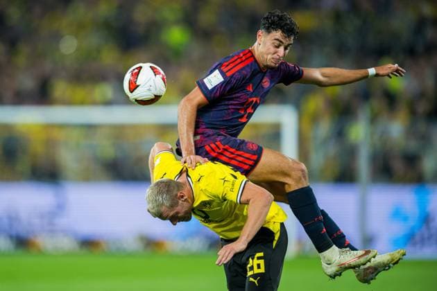 22.08.2026 - Fußball, 2026 2027, Franz-Beckenbauer-Supercup, Borussia Dortmund - FC Bayern München: (L-R) Julian Ryerson (Dortmund), Aleksandar Pavlovic (München) DFB REGULATIONS PROHIBIT ANY USE OF PHOTOGRAPHS AS IMAGE SEQUENCES AND OR QUASI-VIDEO. *** August 22, 2026 Soccer, 2026–2027, Franz Beckenbauer Super Cup, Borussia Dortmund vs. FC Bayern Munich; L R: Julian Ryerson (Dortmund), Aleksandar Pavlovic (Munich); DFB regulations prohibit any use of photographs as image sequences and or quasi-video