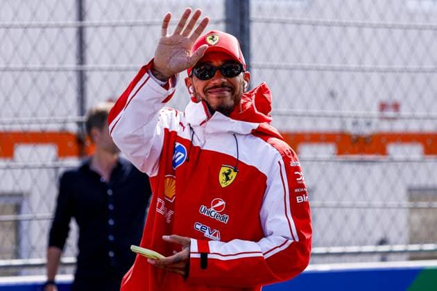 ZANDVOORT - Lewis Hamilton of Great Britain, driver for Scuderia Ferrari HP, during the drivers parade for the Formula 1 Heineken Dutch Grand Prix at Circuit Zandvoort on August 23, 2026, in Zandvoort, the Netherlands. MARCEL TER BALS ANP xVIxANPxSportx xMarcelxterxBalsxIVx 566094500 originalFilename: 566094500.jpg